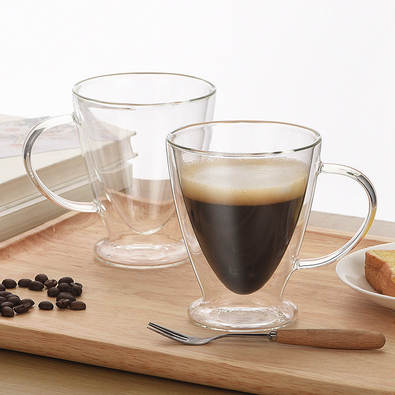 Double-wall glass cups with coffee on a wooden tray